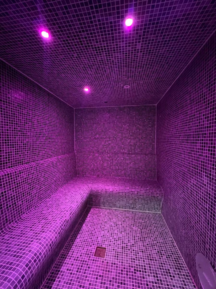 Uma cama ou camas num quarto em Hotel O Gato & Spa