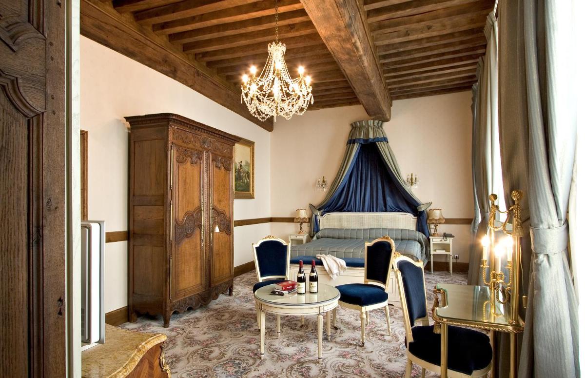 Coin salon dans l'établissement Hôtel Le Cep & Spa
