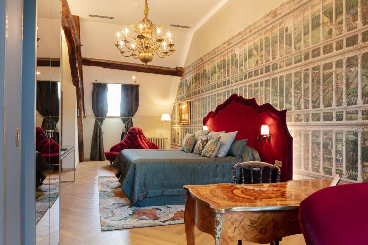 Coin salon dans l'établissement Hôtel Le Cep & Spa