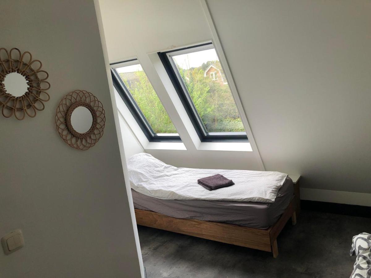 Holiday Home de witte raaf with garden and hottub - Housity