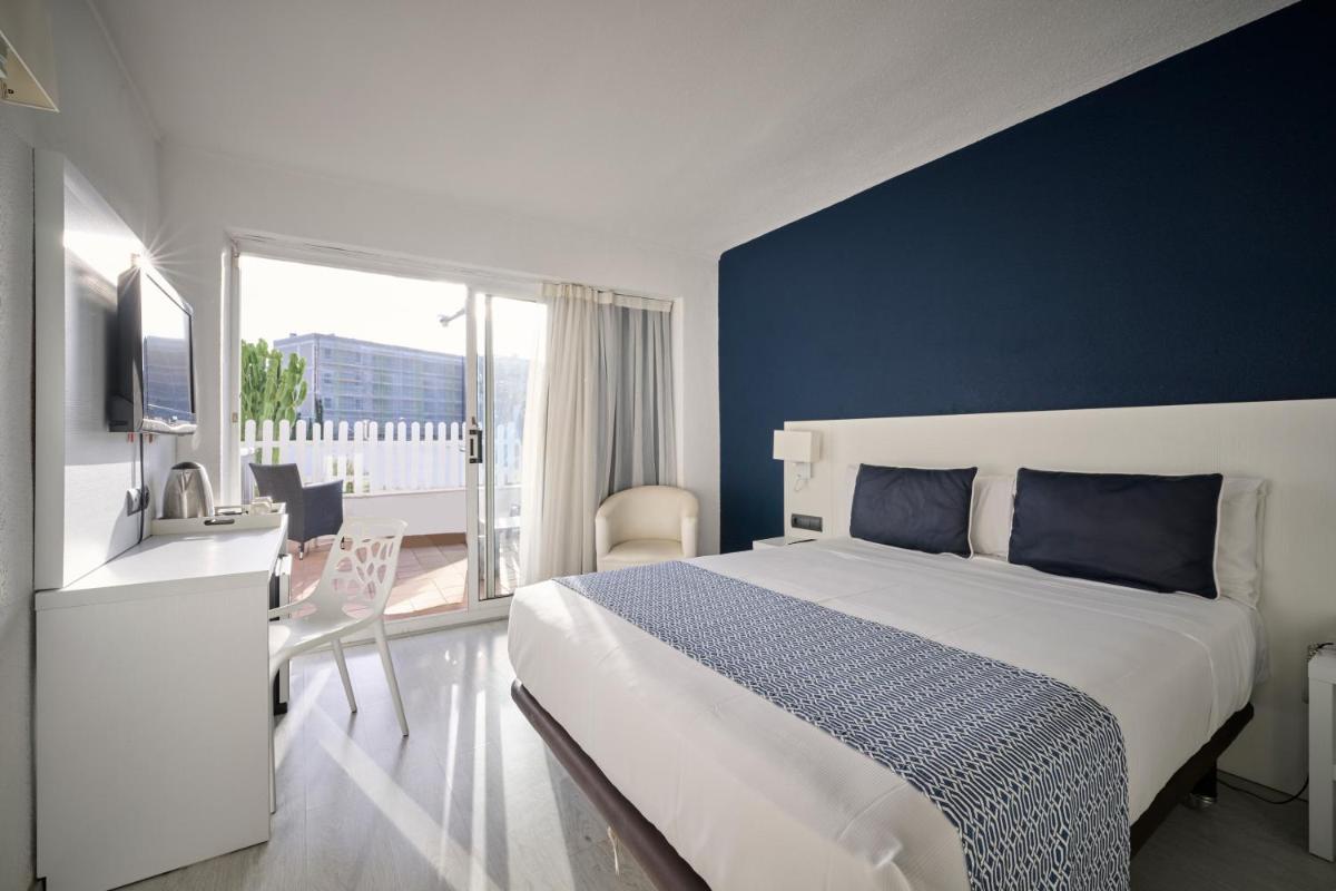 Cama o camas de una habitación en Catalonia del Mar - Adults Only