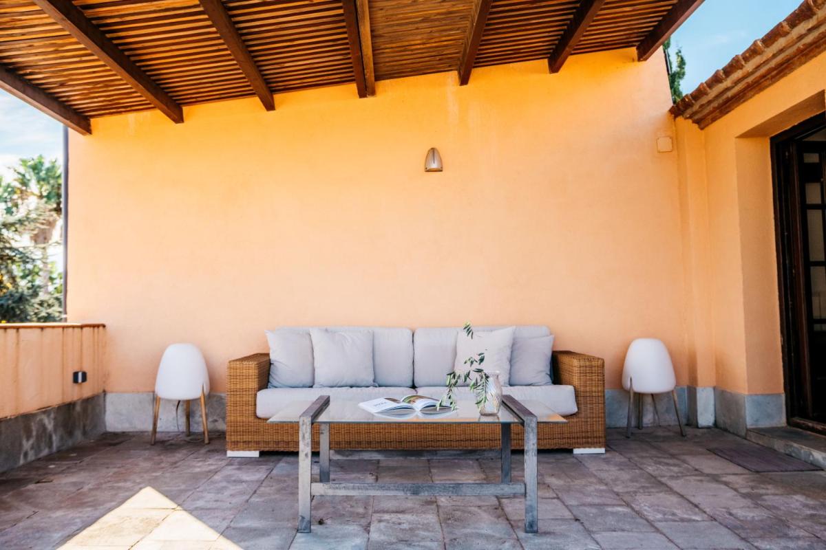 Zona de estar de Hotel Boutique Mas Passamaner