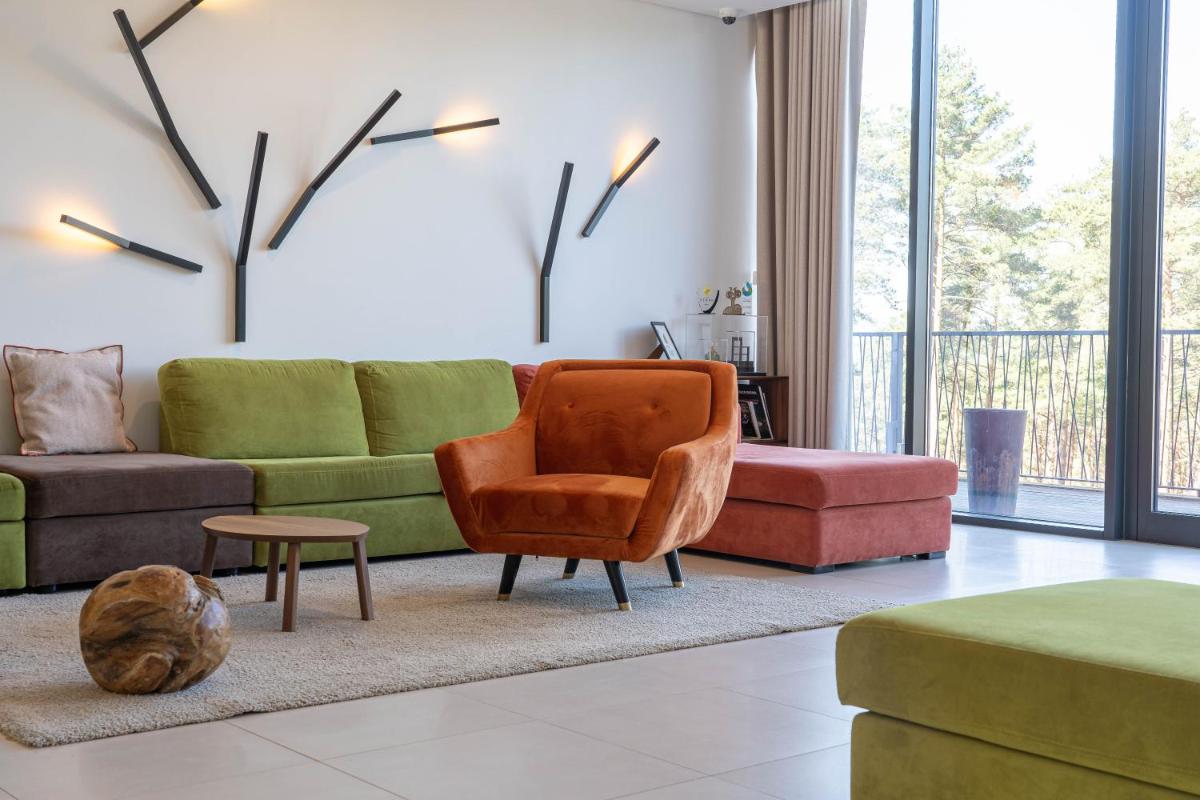 Uma área de estar em Pena Park Hotel