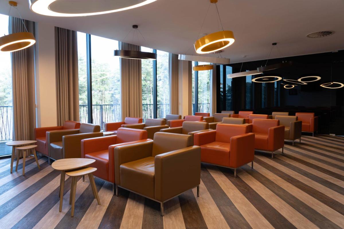 Uma área de estar em Pena Park Hotel