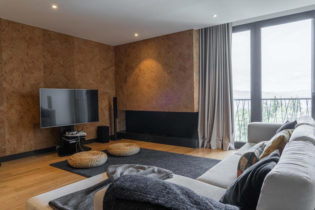 Uma televisão e/ou sistema de entretenimento em Pena Park Hotel