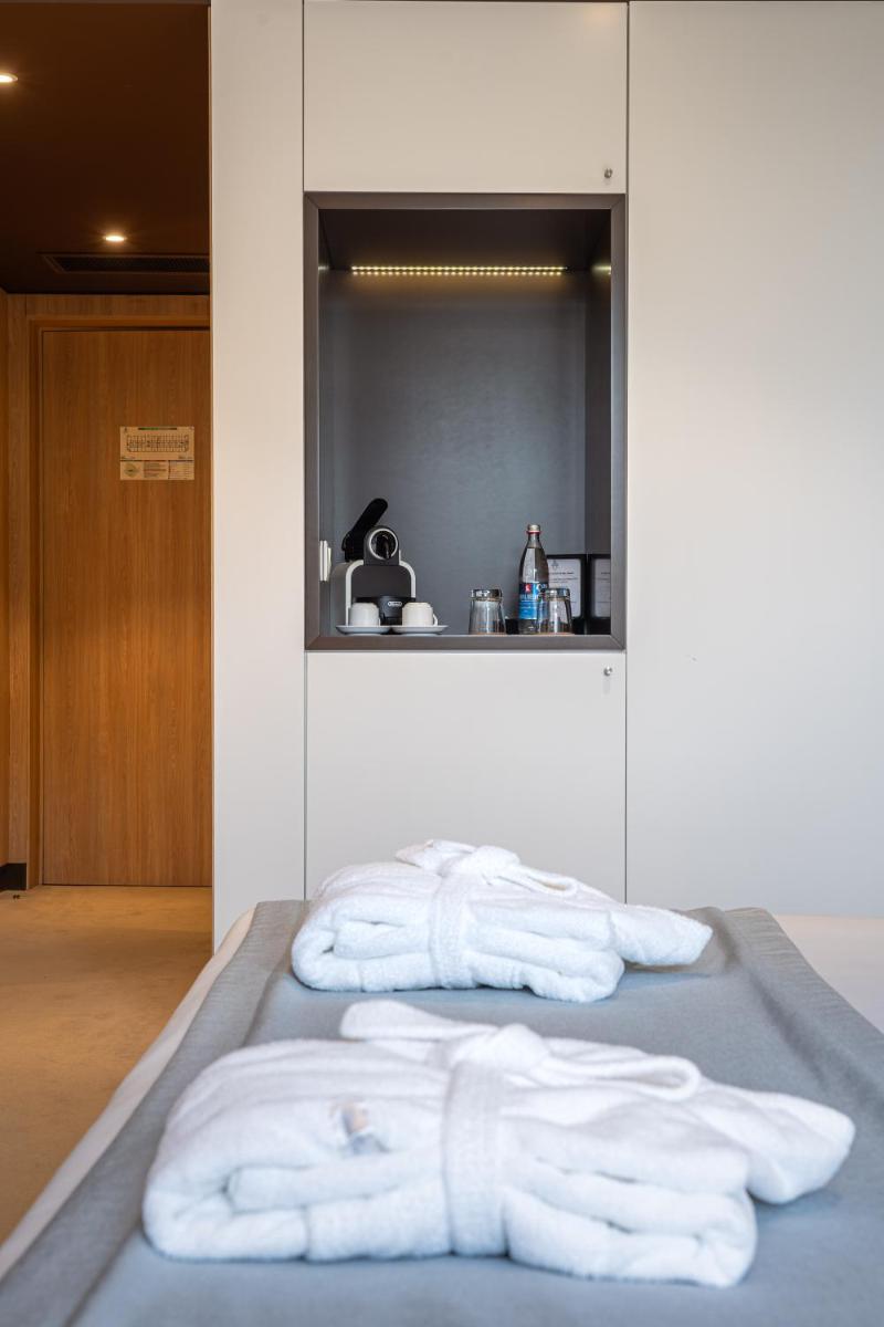 Uma cama ou camas num quarto em Pena Park Hotel