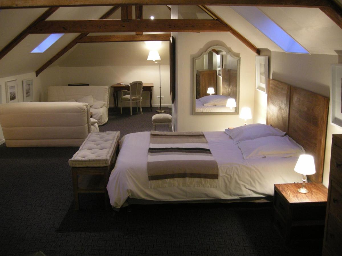 Un ou plusieurs lits dans un hébergement de l'établissement Domaine de Joinville & Spa