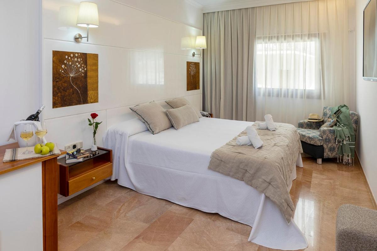 Cama o camas de una habitación en Hotel Spa Porto Cristo