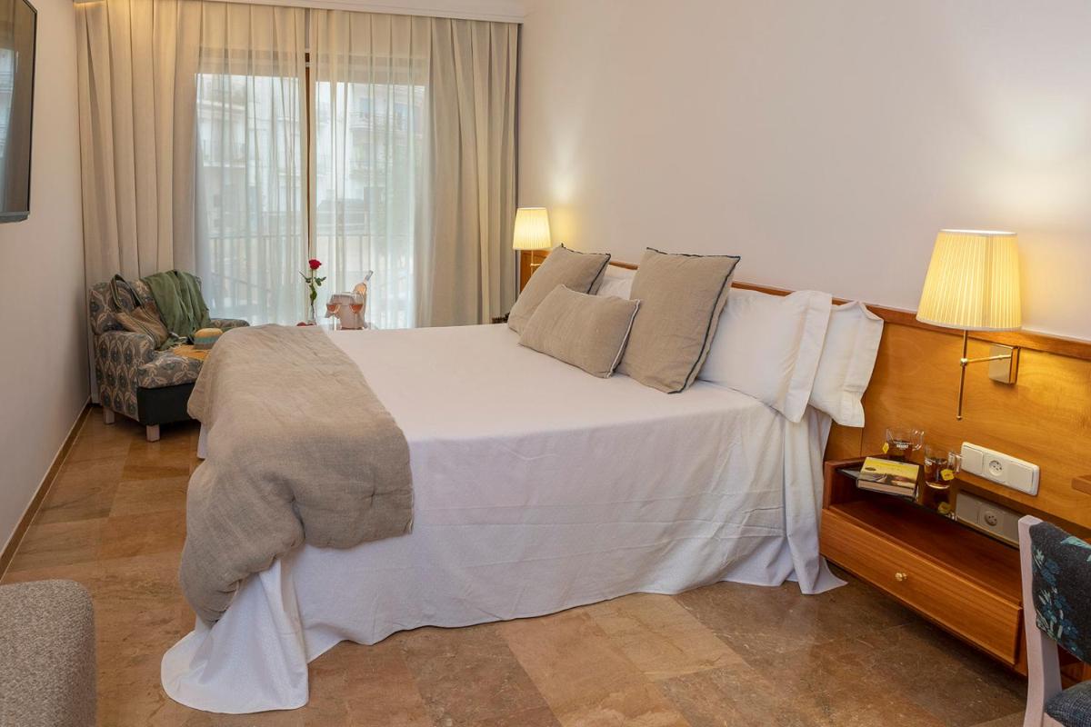Cama o camas de una habitación en Hotel Spa Porto Cristo