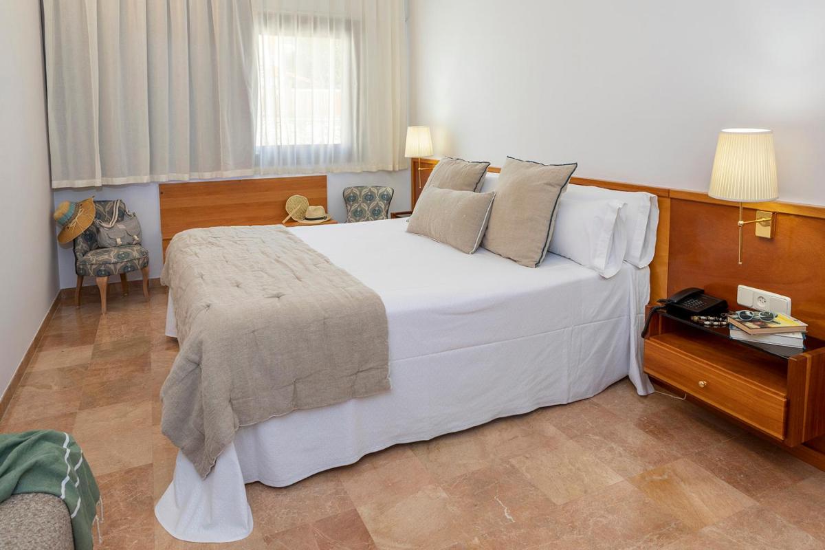 Cama o camas de una habitación en Hotel Spa Porto Cristo