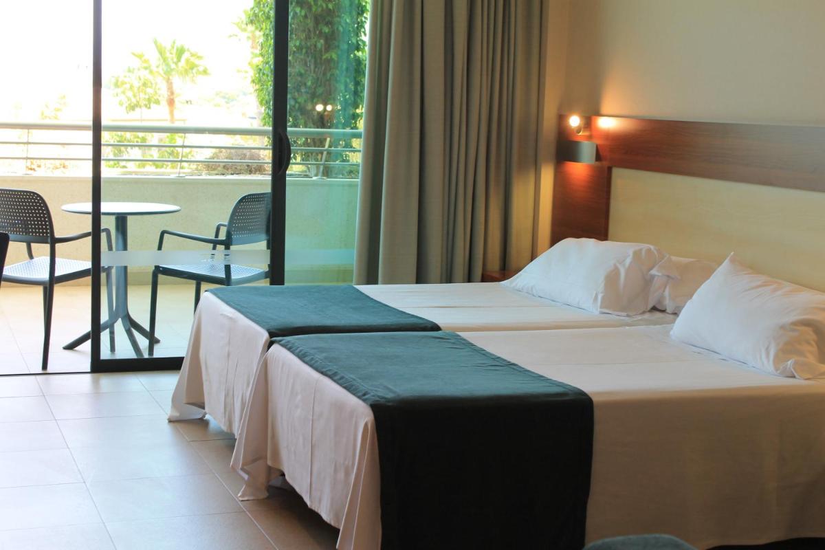 Cama o camas de una habitación en Hotel Deloix 4* Sup