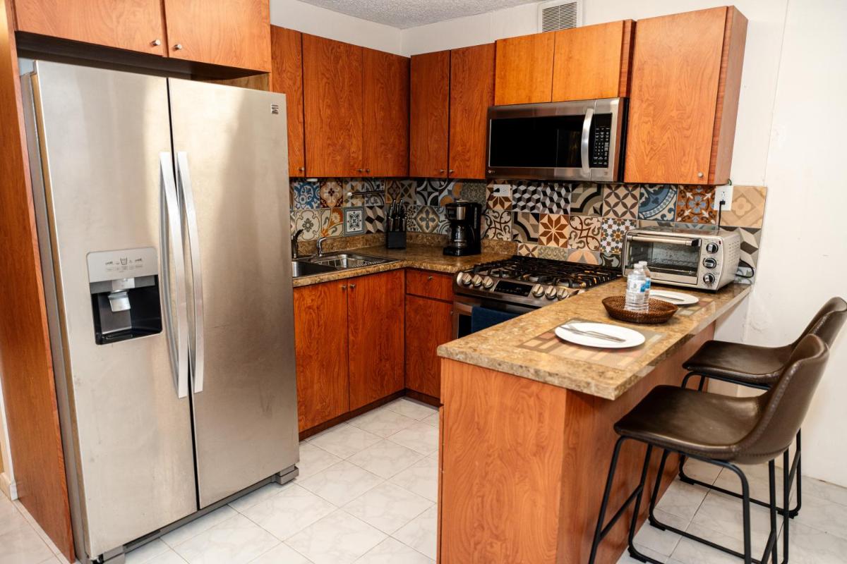 Oasis in the South of the Island with FREE parking and laundry - Housity