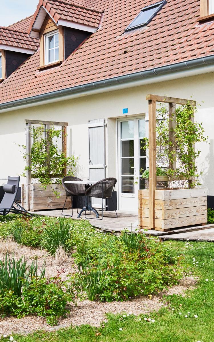 Jardin de l'établissement Hotel Spa Les Saules