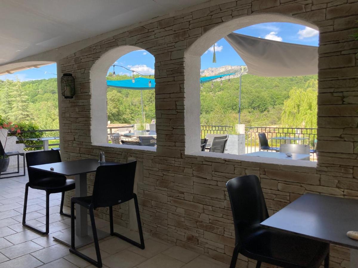 Balcon ou terrasse dans l'établissement Hôtel Spa L'Ermitage
