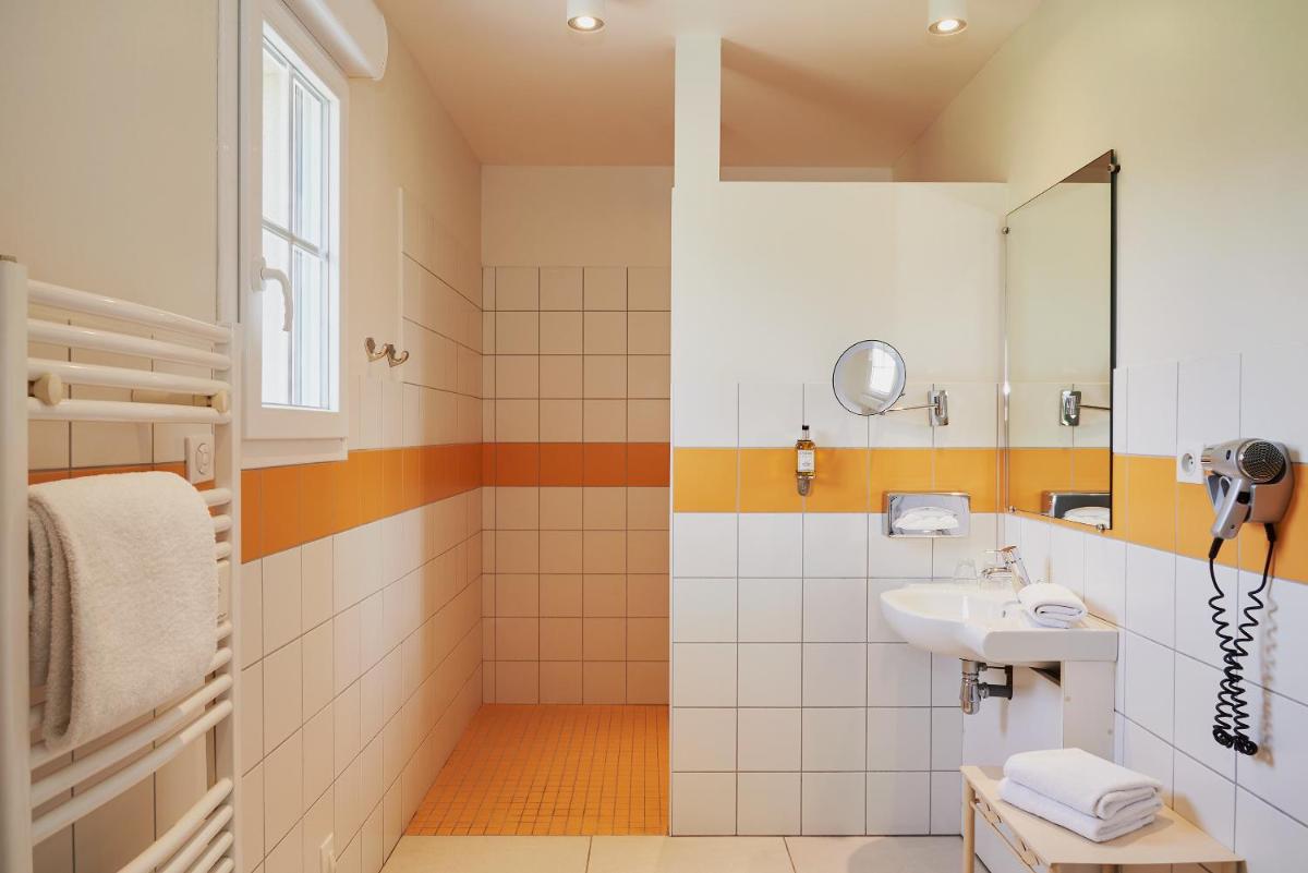 Salle de bains dans l'établissement Hotel Spa Les Saules