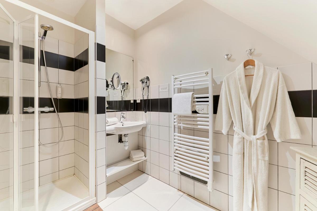 Salle de bains dans l'établissement Hotel Spa Les Saules