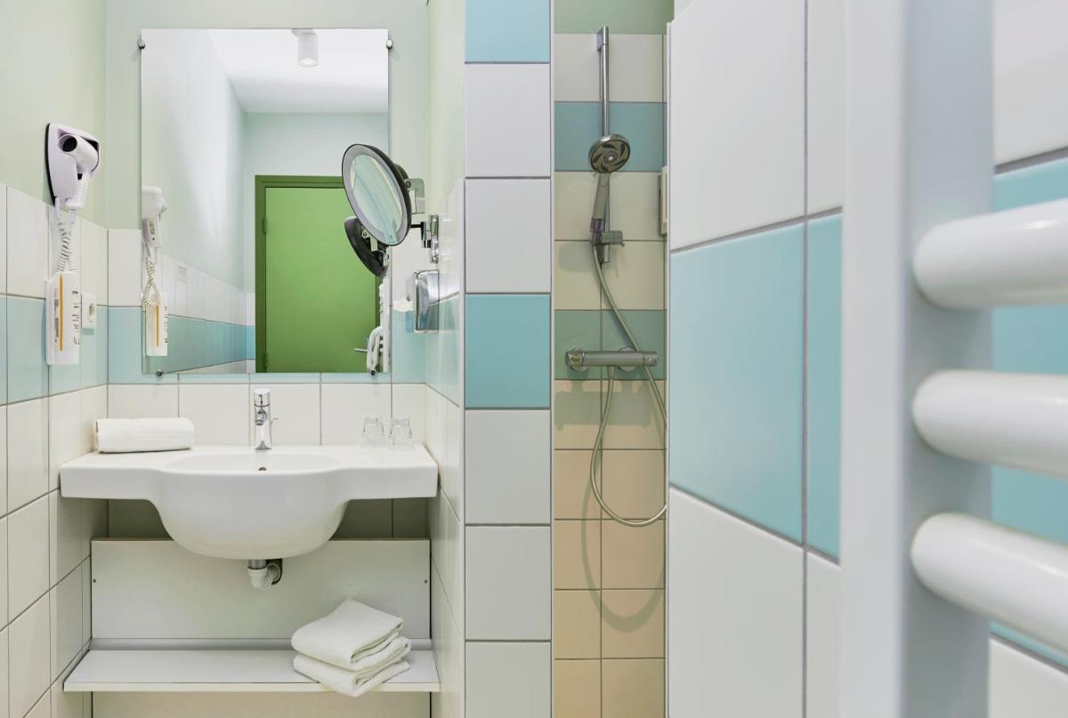 Salle de bains dans l'établissement Hotel Spa Les Saules