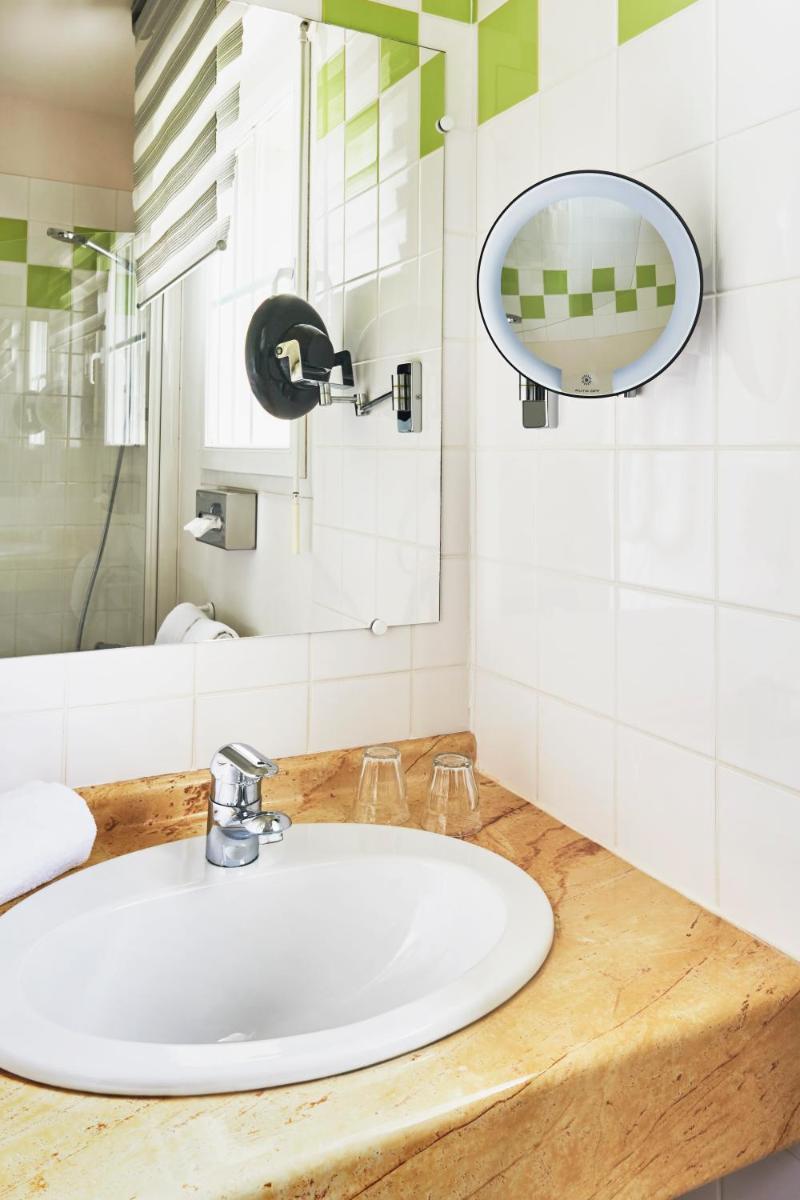Salle de bains dans l'établissement Hotel Spa Les Saules