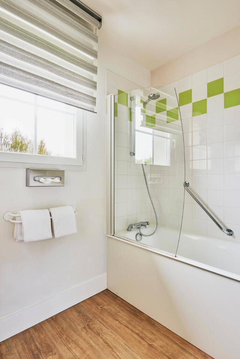 Salle de bains dans l'établissement Hotel Spa Les Saules
