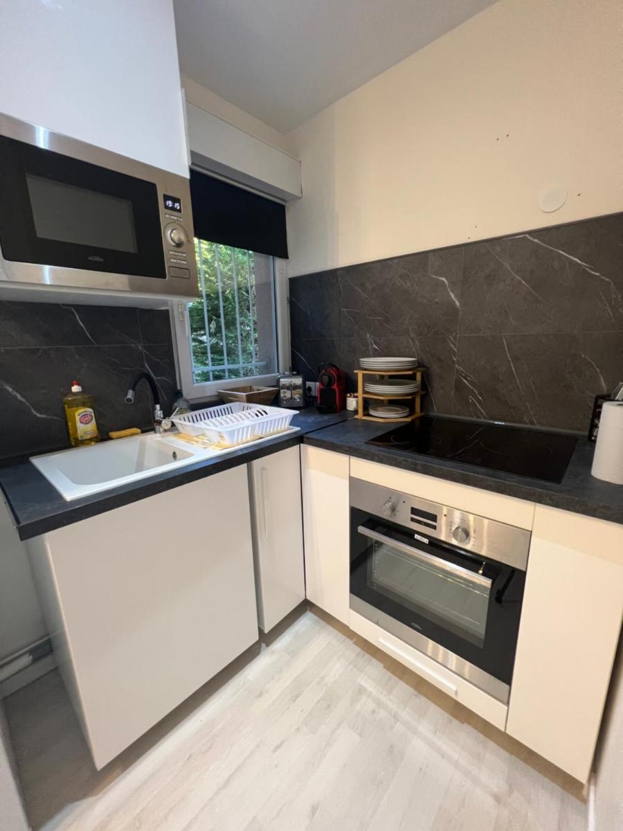 Appartement avec place de parking privé et jardin - Housity