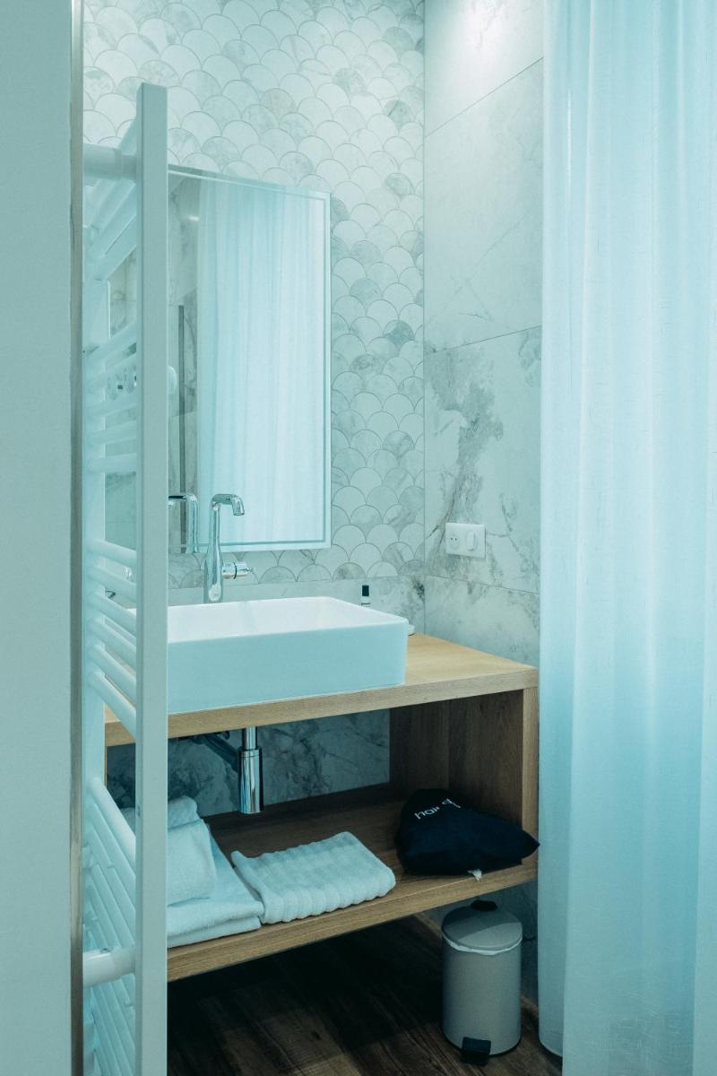 Salle de bains dans l'établissement Hôtel Casale Olmia