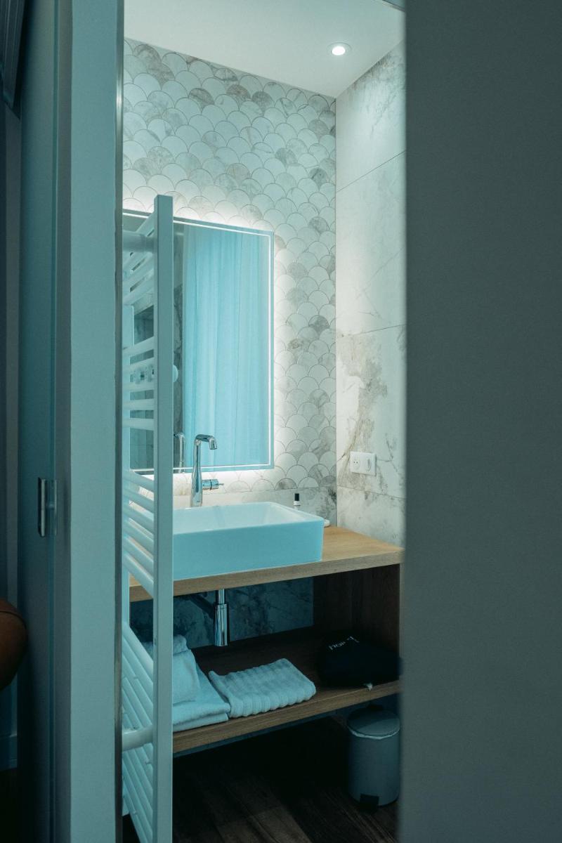 Salle de bains dans l'établissement Hôtel Casale Olmia