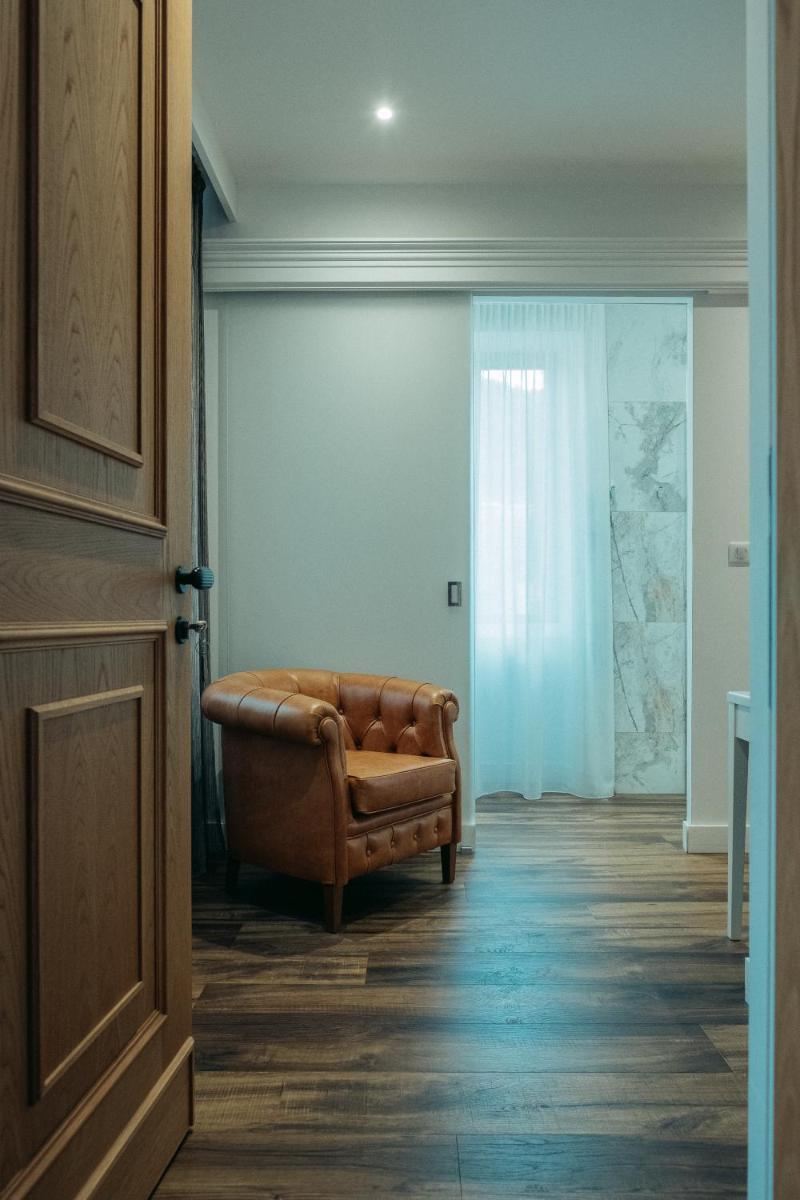 Coin salon dans l'établissement Hôtel Casale Olmia
