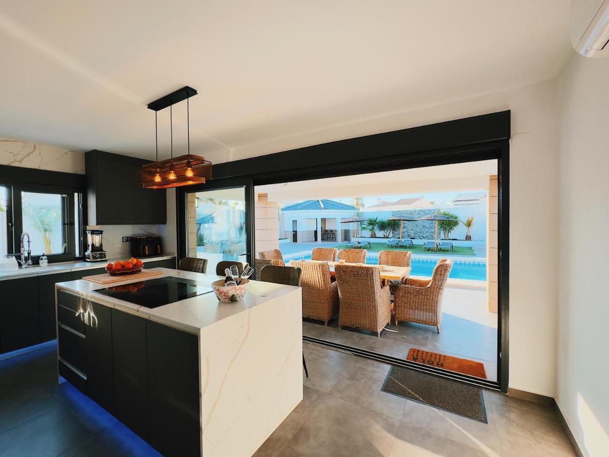 Suitetrails - Private Luxury 5 Bedroom Villa Tropical Garden With Waterfall, Pool, Bar, BBQ, Rated best location in Torrevieja close to Beach, Waterparks, Bars & Restaurants