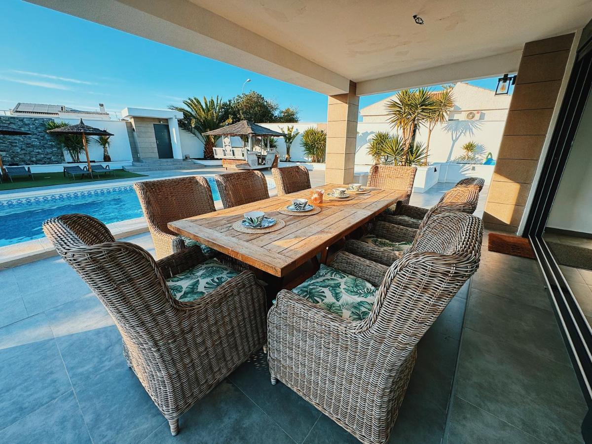 Suitetrails - Private Luxury 5 Bedroom Villa Tropical Garden With Waterfall, Pool, Bar, BBQ, Rated best location in Torrevieja close to Beach, Waterparks, Bars & Restaurants