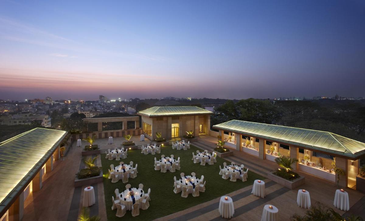 an overhead view of a building with tables and chairs at ITC Gardenia, a Luxury Collection Hotel, Bengaluru in Bengaluru an overhead view of a building with tables and chairs at ITC Gardenia, a Luxury Collection Hotel, Bengaluru in Bengaluru