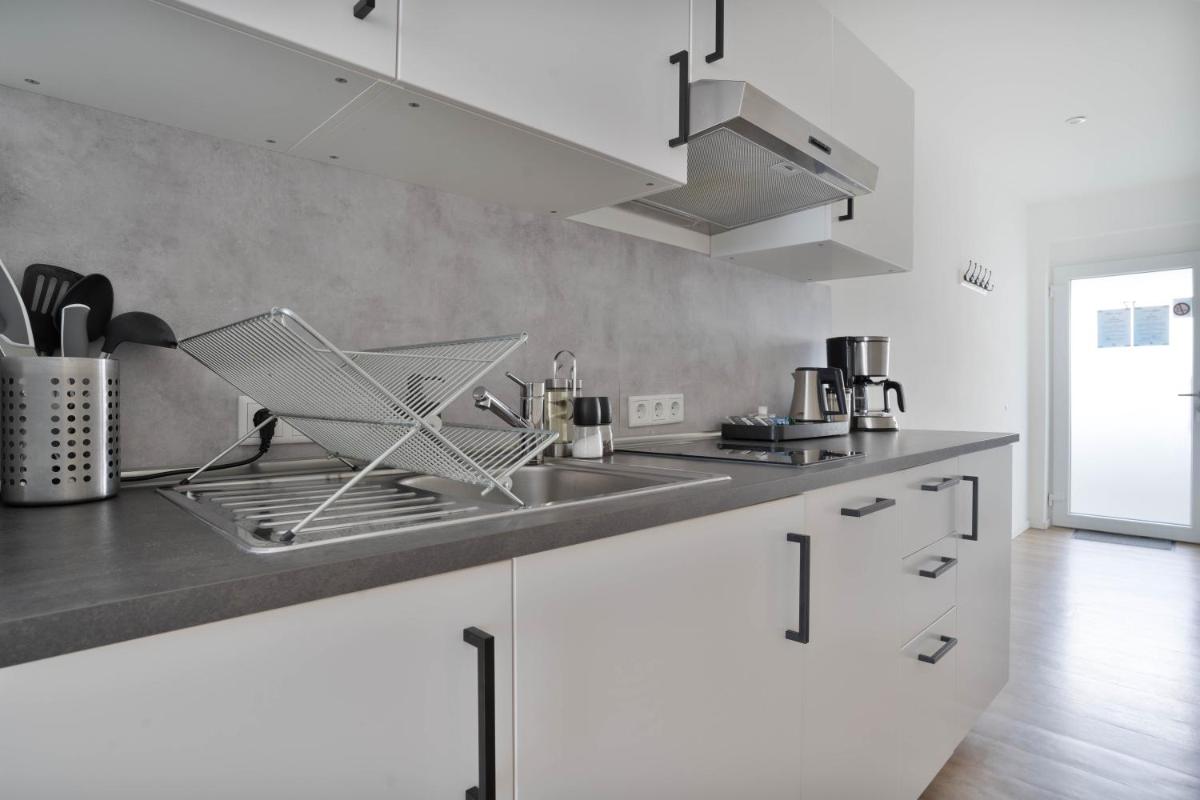 Apartments in the city center I private parking I home2share - Housity