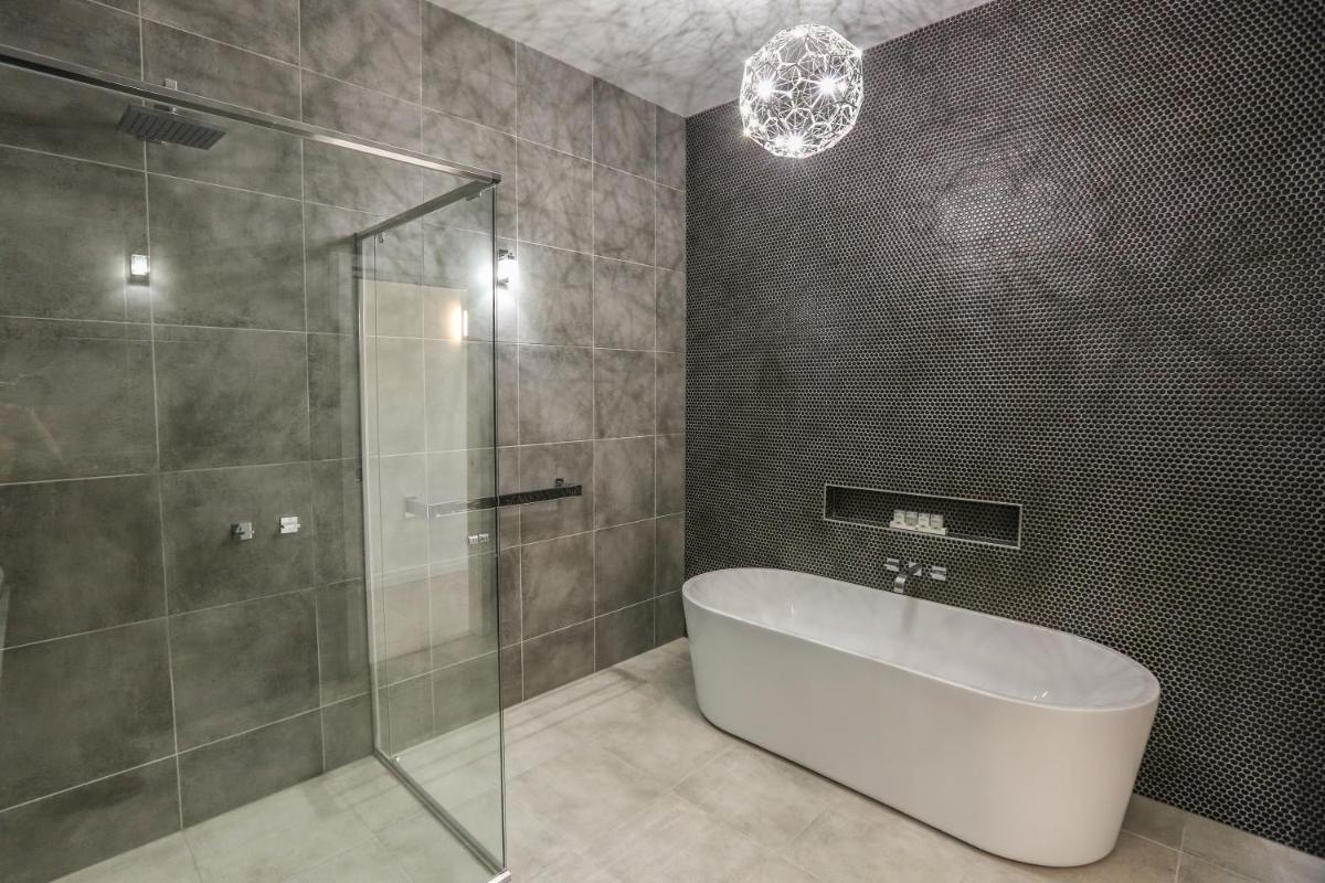 Indulge Apartments - CBD - Housity
