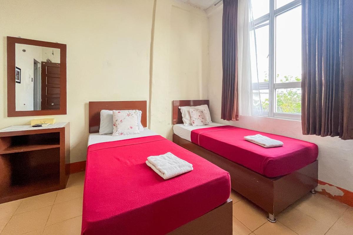 Urbanview Poma Hotel - Housity