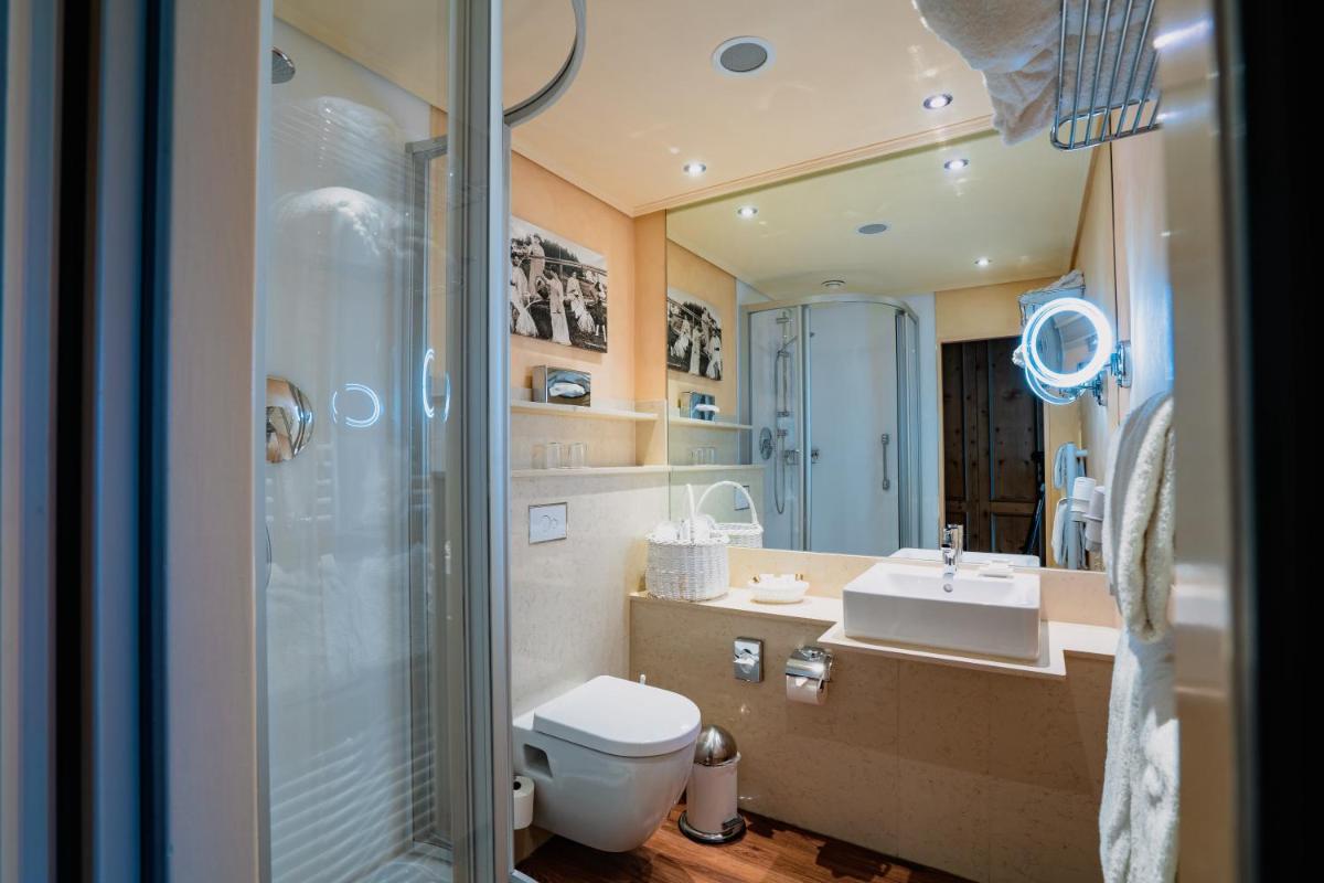 Ein Badezimmer in der Unterkunft revita - naturresort & spa