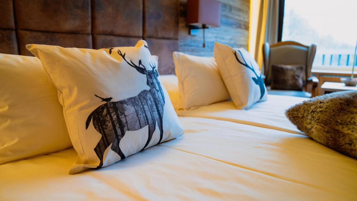 Ein Bett oder Betten in einem Zimmer der Unterkunft revita - naturresort & spa