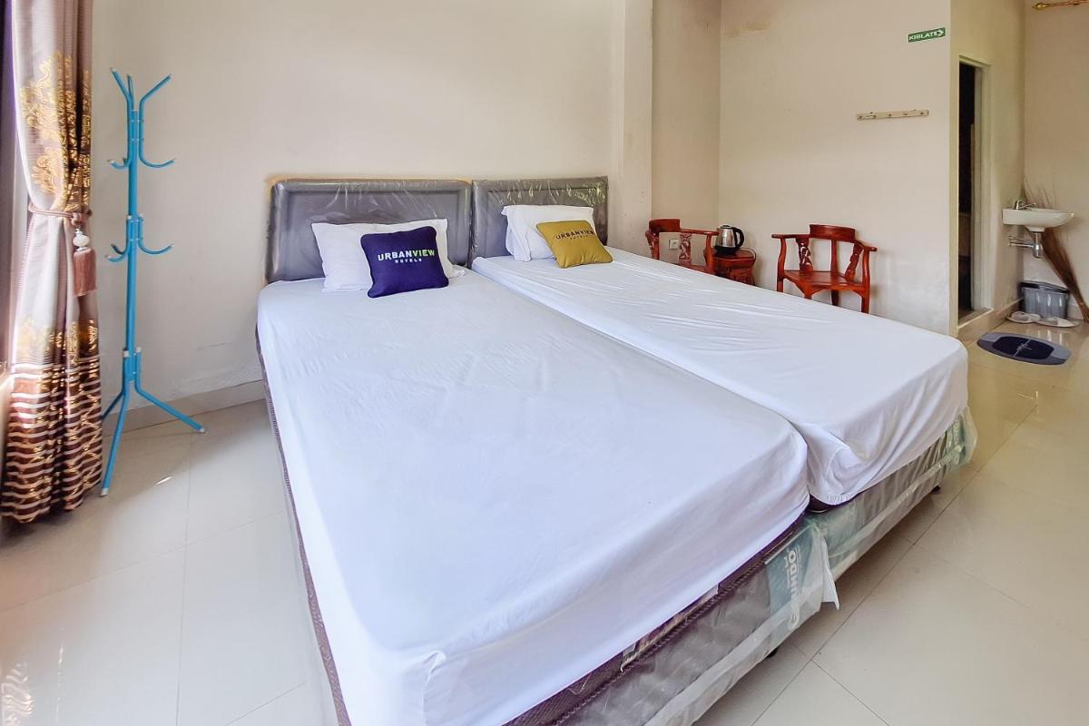 Urbanview Hotel Penginapan Ananda - Housity