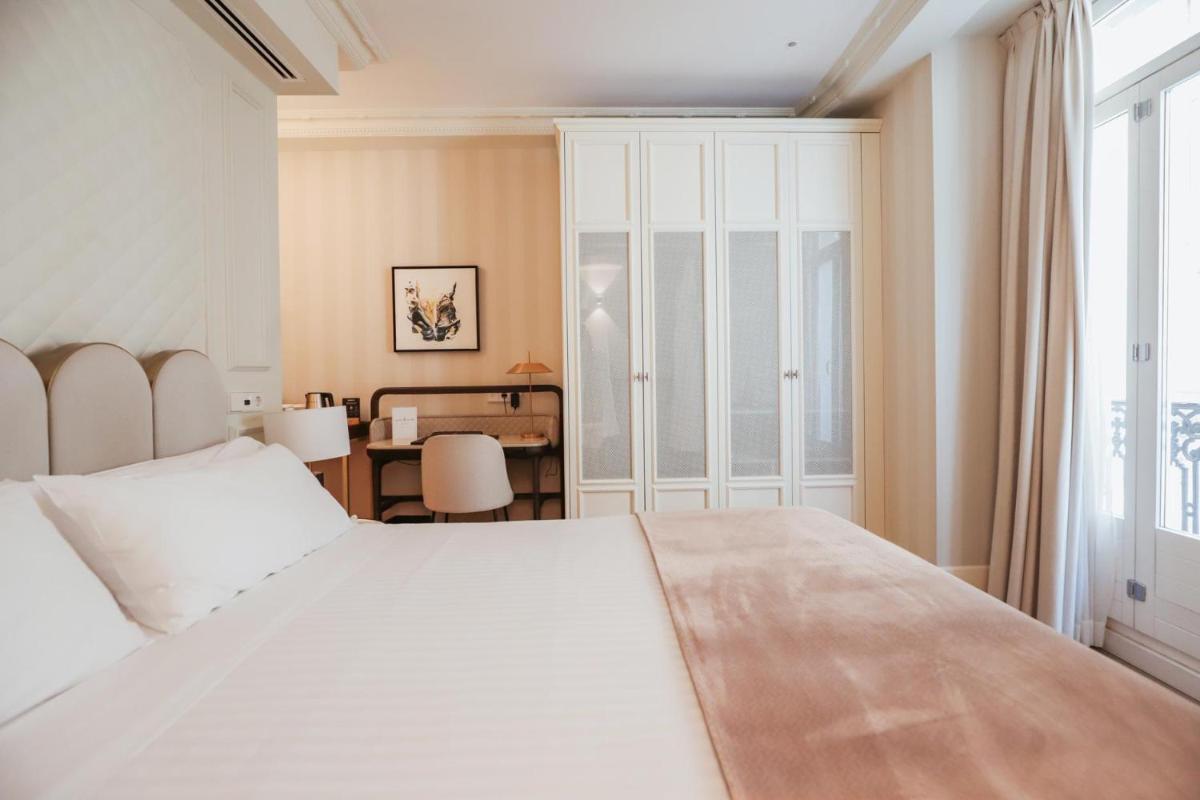 Cama o camas de una habitación en MYR Palacio Vallier