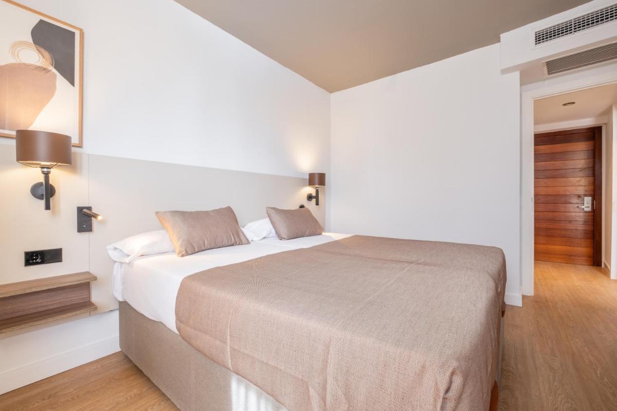Cama o camas de una habitación en Aparthotel Duva & Spa