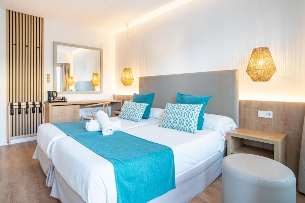 Cama o camas de una habitación en Bahía de Alcudia Hotel & Spa
