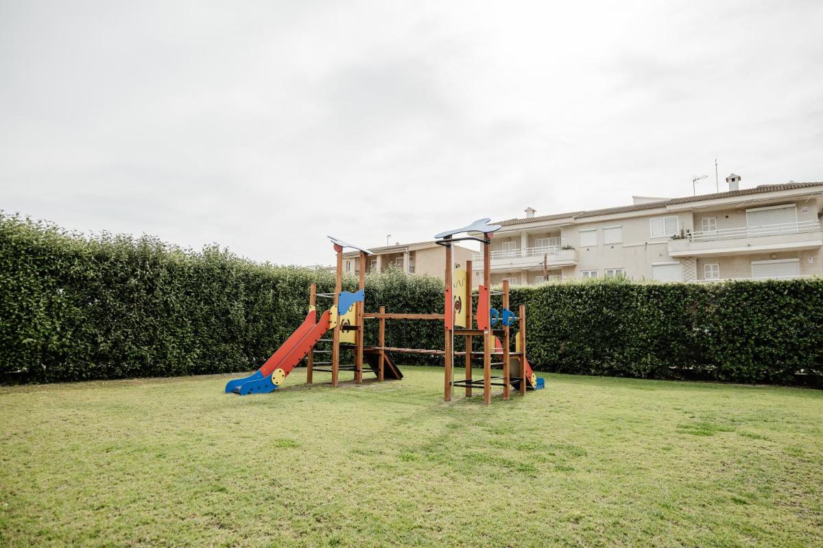 Zona de juegos infantil en Aparthotel Dunes Platja