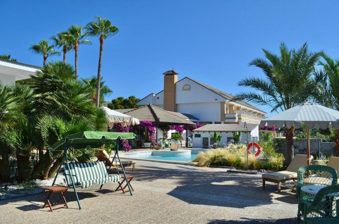 Jardín al aire libre en La Moraleja The Quiet Hotel - Adults Only