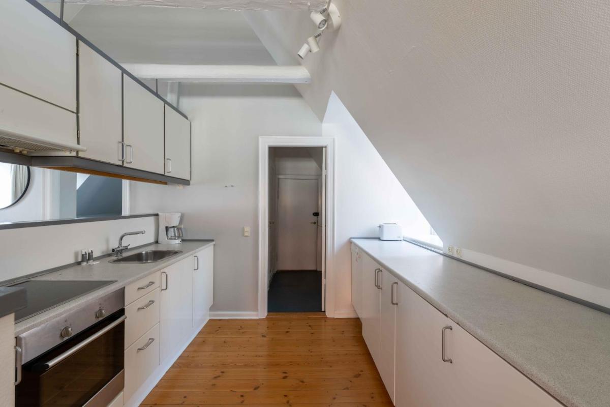 Unique Apartment w Exposed Beams Next to Tivoli - Housity
