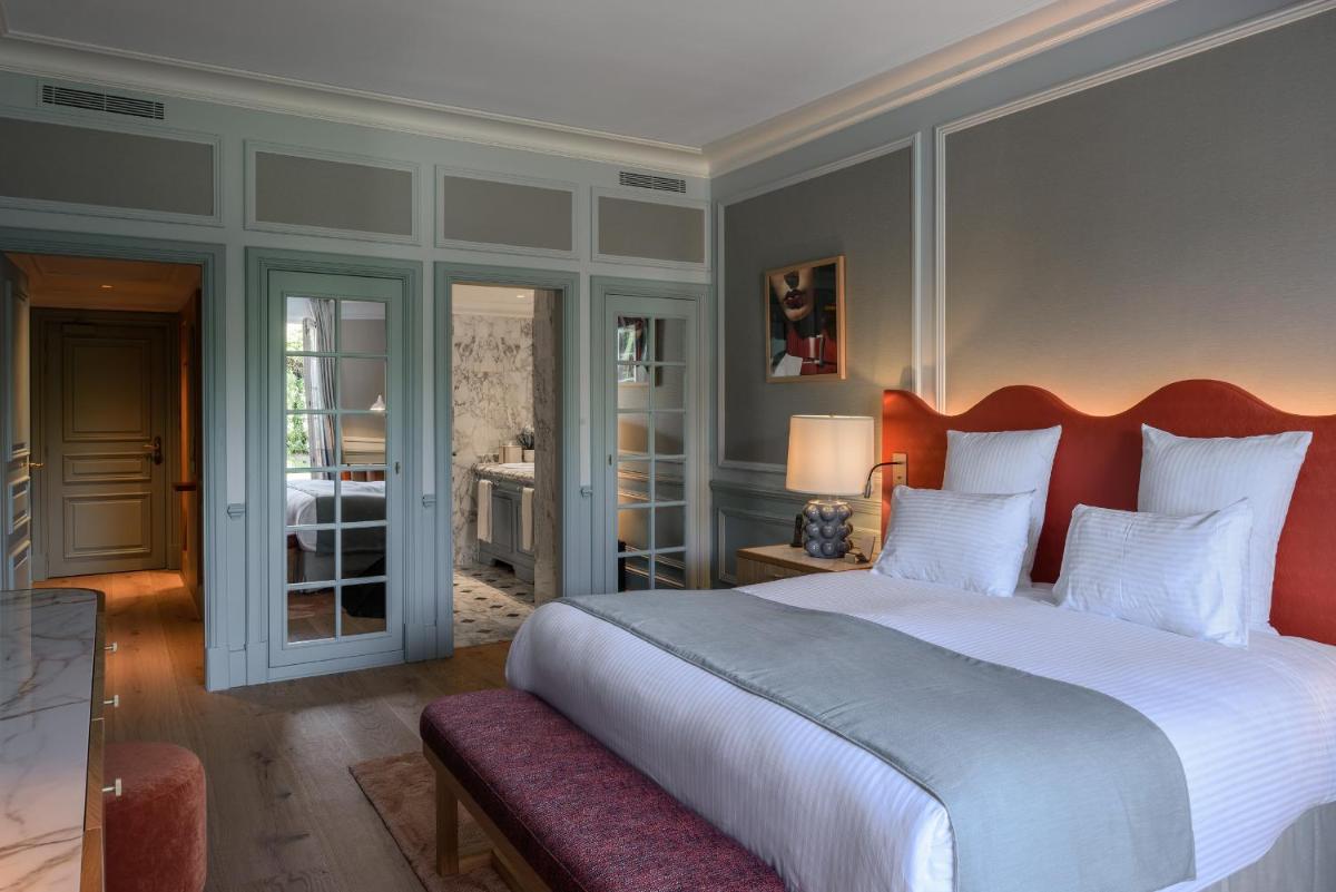 Un ou plusieurs lits dans un hébergement de l'établissement Althoff Hotel Villa Belrose