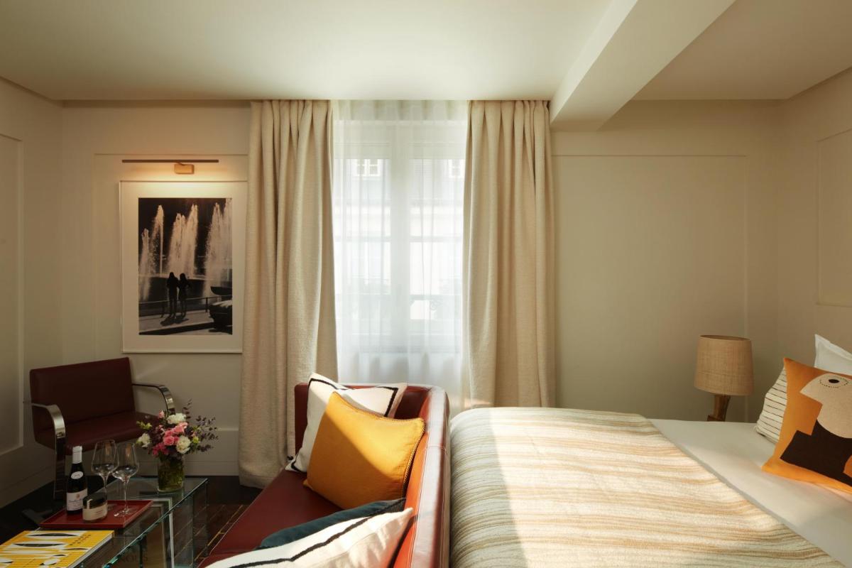 Un ou plusieurs lits dans un hébergement de l'établissement Hotel La Villa Saint Germain Des Prés