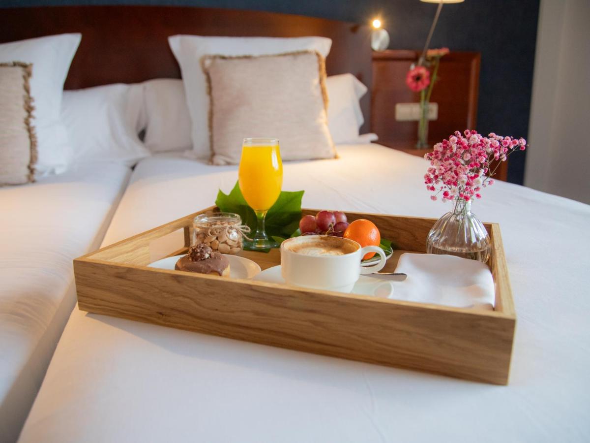 Cama o camas de una habitación en Hotel Spa Galatea