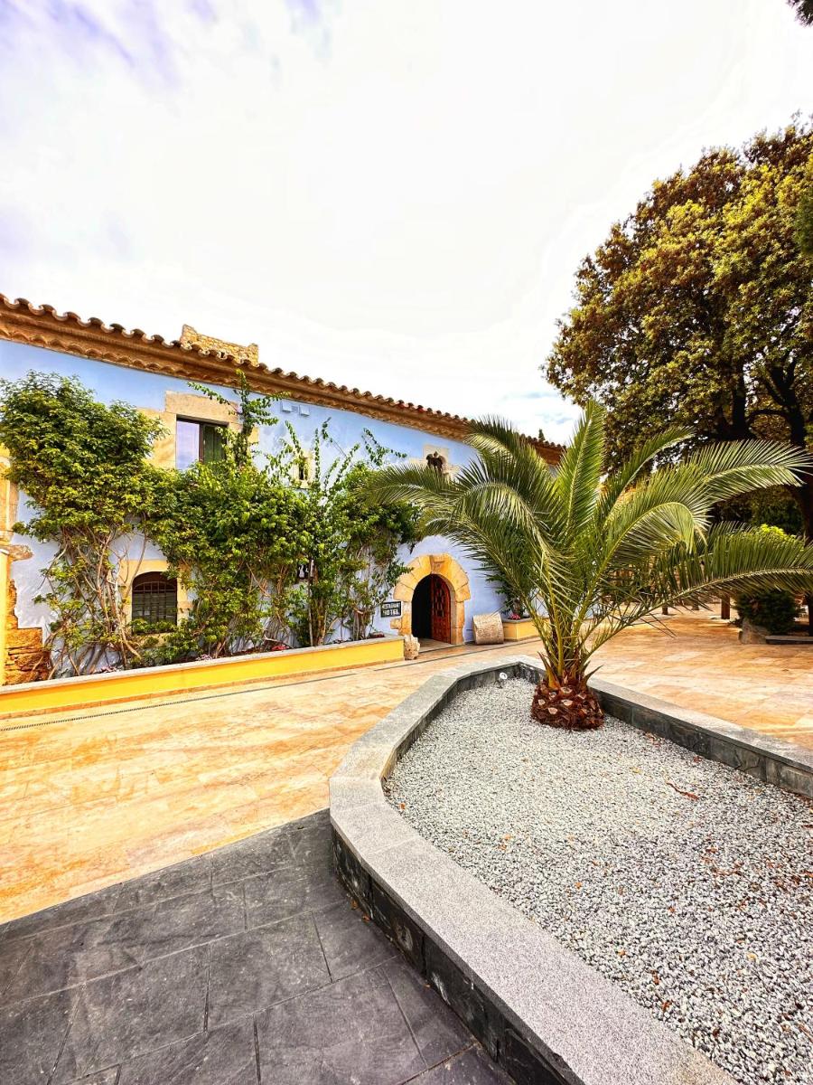 Jardín al aire libre en Boutique Hotel Comtal Empuries