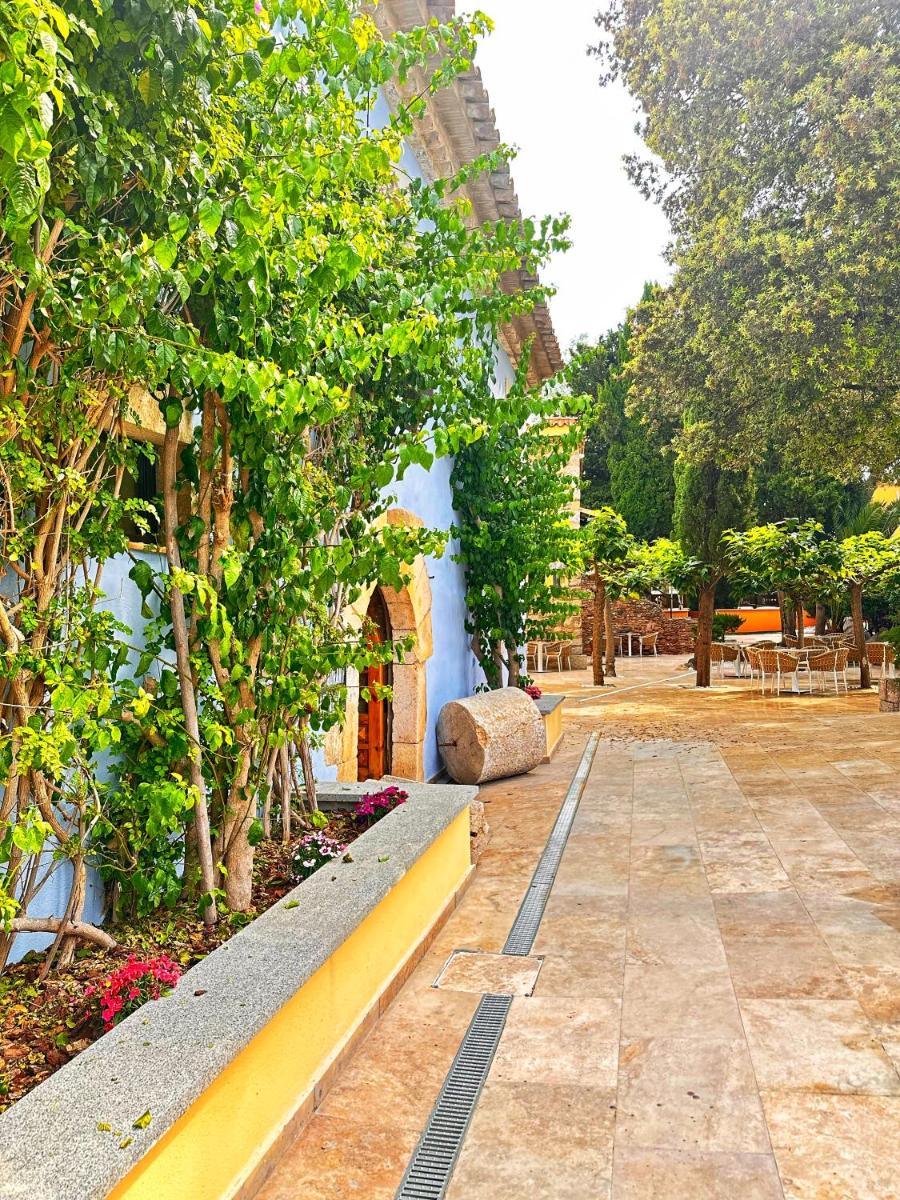 Jardín al aire libre en Boutique Hotel Comtal Empuries
