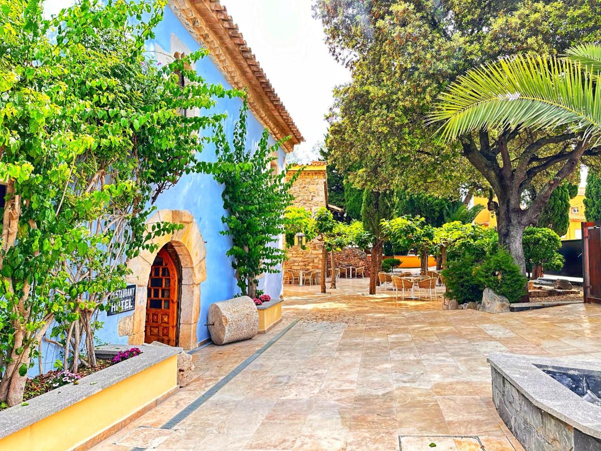 Jardín al aire libre en Boutique Hotel Comtal Empuries