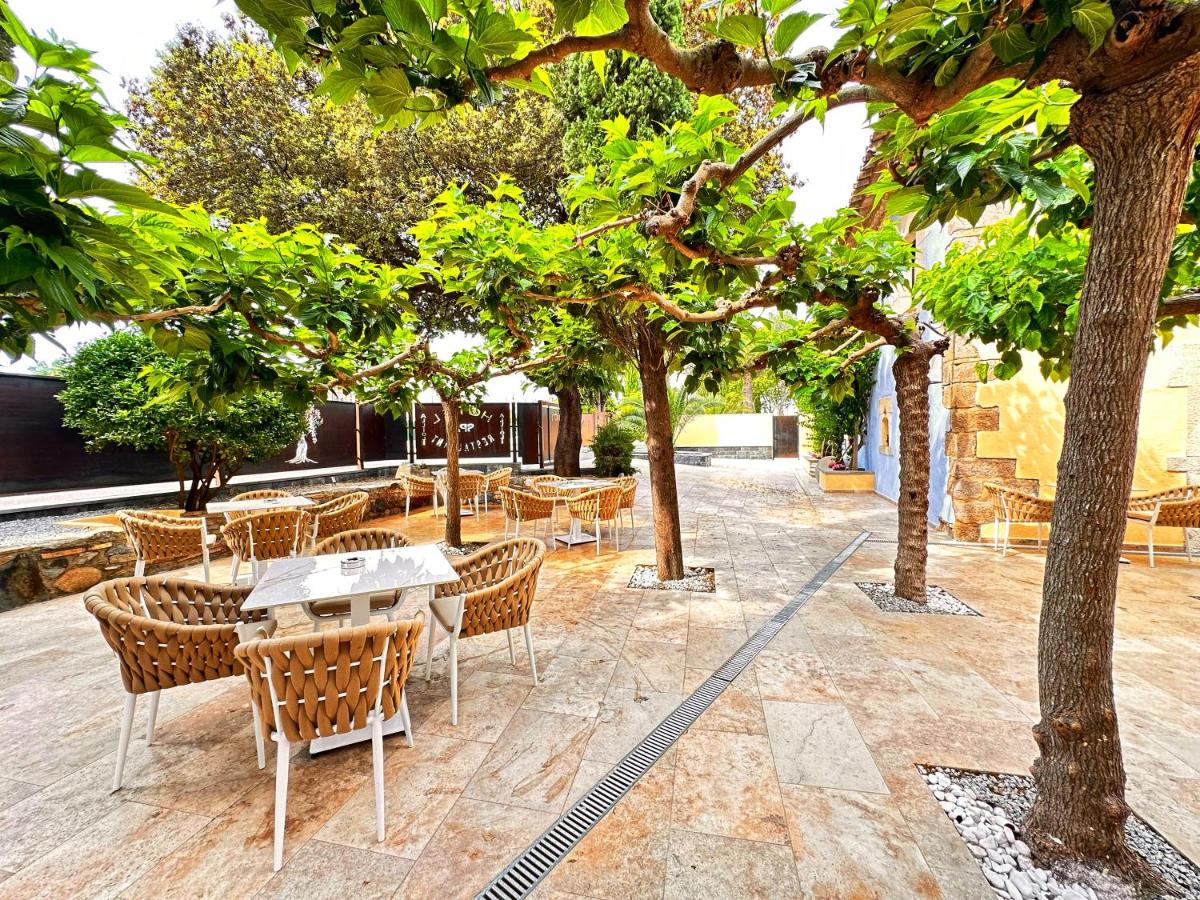 Jardín al aire libre en Boutique Hotel Comtal Empuries