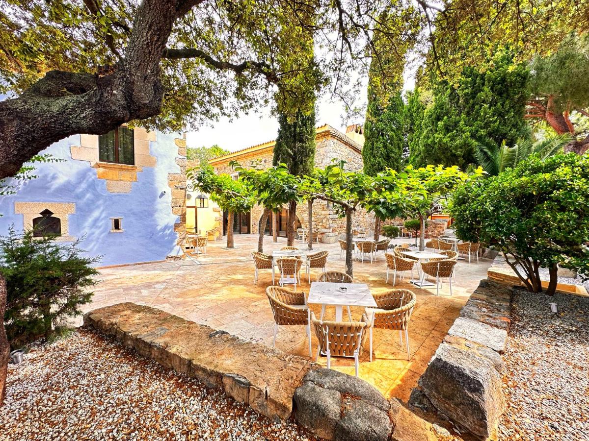 Jardín al aire libre en Boutique Hotel Comtal Empuries